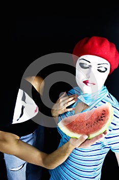 Mimes and a water-melon