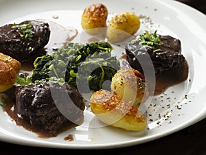 The `Mimos de Porco Preto` is a typical plate from Mediterranean Food made with Black Pig Meat.