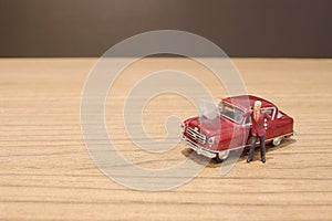 a min figures of a people and car