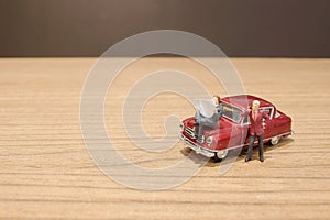 a min figures of a people and car