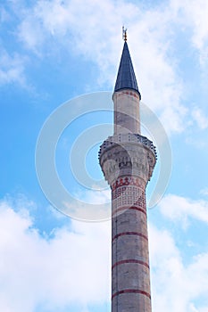 Minaret of the Blue Mosque of Sultanahmed, located in Istanbul, Turkey. Architectural detail photo