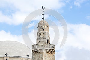 The minaret of Caliph Omar mosque is located near Hurva Synagogue in old city of Jerusalem, Israel