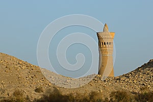 Minaret and desert sand