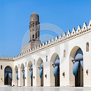 Minaret of historic Al Hakim Mosque known as The Enlightened Mosque, Moez Street, Old Cairo, Egypt photo