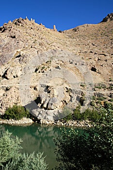 The Minaret of Jam, a UNESCO site in central Afghanistan. Ruins of a nearby Ghurid settlement. photo