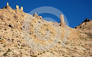 The Minaret of Jam, a UNESCO site in central Afghanistan. Ruins of a nearby Ghurid settlement. photo