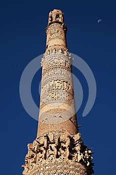 The Minaret of Jam, a UNESCO site in central Afghanistan. Showing detail of the upper part of the tower and moon.