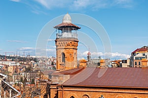 Minaret of Jumah Mosque in Abanotubani area of Old Tbilisi photo