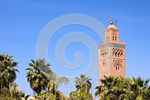 Minaret of Koutoubia mosque on blue sky background in Marrakech, Morocco