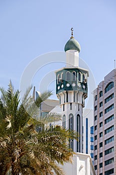 Minaret of the mosque against blue skies in Abu Dhabi, UAE