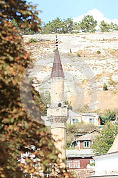 Minaret of a mosque in Bakhchysaray. Crimea.