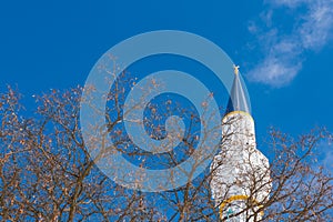 Minaret mosque with blue background