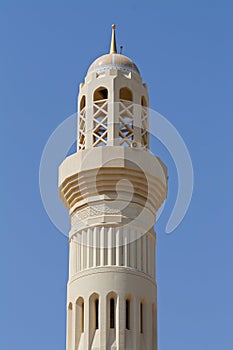 Minaret of a mosque in Oman photo