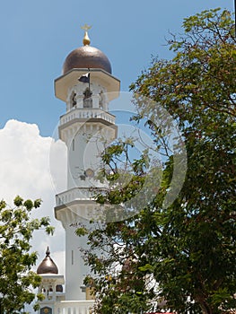 The minaret of the mosque in UNESCO World Heritage Site of Geogetown, Penang, Malaysia.