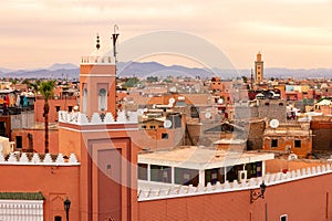Minaret tower on the historical walled city (medina) in Marrakech. Morocco photo