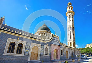 Minaret tower of mosque in old town Nabeul. Tunisia, North Africa