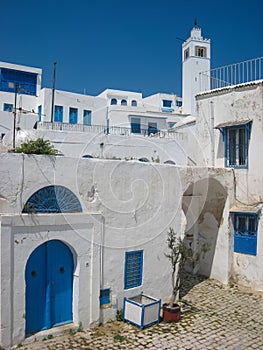 Minaret and blue windows. Sidi Bou Said. Tunisia photo