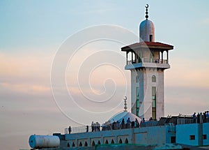 Minaret of Zahra mosque in al ameen street in Damascus photo
