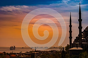 Minarets and domes of Blue Mosque with Bosporus and Marmara sea in background, Istanbul, Turkey.