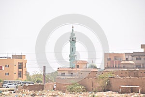 Minarets of Islamic mosques from the `Lamab` and `Rimila` neighborhoods in Khartoum, Sudan in the neighborhoods inhabited by middl