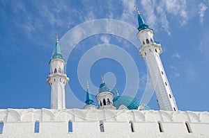 The minarets of the Kul Sharif mosque against the blue sky.