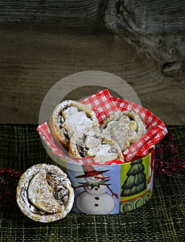 Mince Pies in a Christmas decorated tin box