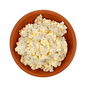 Minced garlic in a small bowl photo