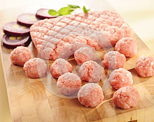 Minced ham. Arrangement on a cutting board. photo