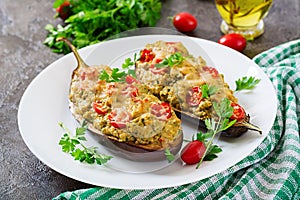 Minced meat chicken and vegetables stuffed eggplants