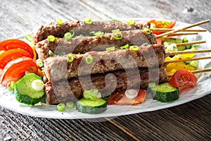 Minced meat kebab with fresh vegetable