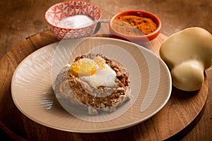 minced meat nest with scamorza cheese and egg