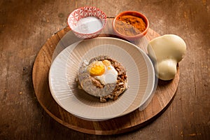 minced meat nest with scamorza cheese and egg