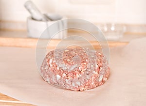 Minced meat over the cutting board