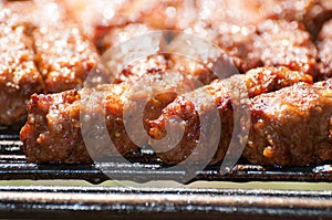 Minced meat rolls on grill (traditional Romanian food) â€“ mititei, mici