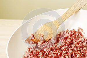 Minced meat with spices in a pan