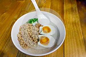 Minced pork congee with egg, fresh ginger