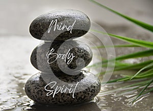 Mind, Body and spirit words engraved on zen stones. Zen concept