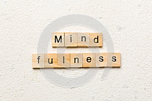 mind fulness word written on wood block. mind fulness text on table, concept