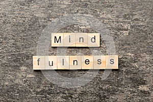 mind fulness word written on wood block. mind fulness text on table, concept