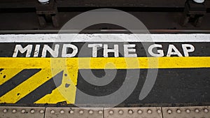 Mind the gap sign in London underground