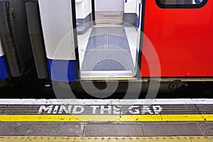 Mind the gap sign on the platform in the London Underground