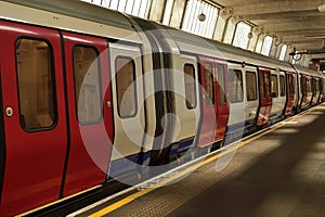 Mind the gap sign on underground platform.