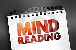 Mind Reading - ability to discern the thoughts of others without the normal means of communication, text on notepad, concept photo