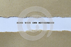 mind your own motherhood on white paper