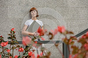 Minded woman with laptop