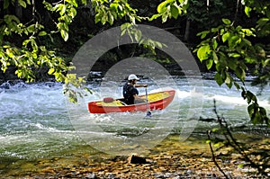 Unknown canoeist, whitewater canoeing at the Minden Wild Water Preserve.