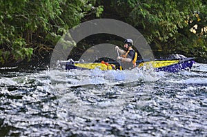 Unknown canoeist, whitewater canoeing at the Minden Wild Water Preserve.