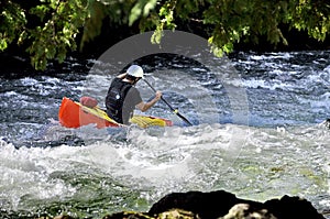 Unknown canoeist, whitewater canoeing at the Minden Wild Water Preserve.