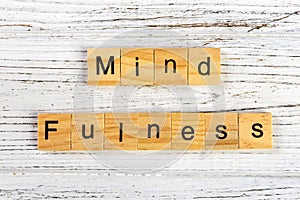mindfulness made with wooden blocks concept. Yoga, succeed, open-minded