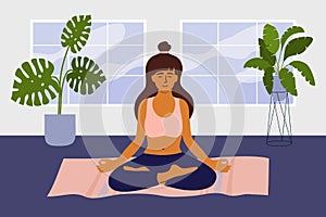 Mindfulness meditation concept with young woman in lotus pose meditating at home